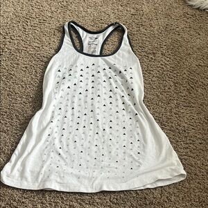 The North Face White Sleeveless Tank Top with Black Trim and Triangular Designs